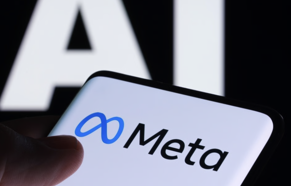 Phone displaying the Meta logo held against a backdrop of the letters AI, illustrating the company's announced May and July 2026 policy shifts on AI-generated content labeling and deepfake video removal.